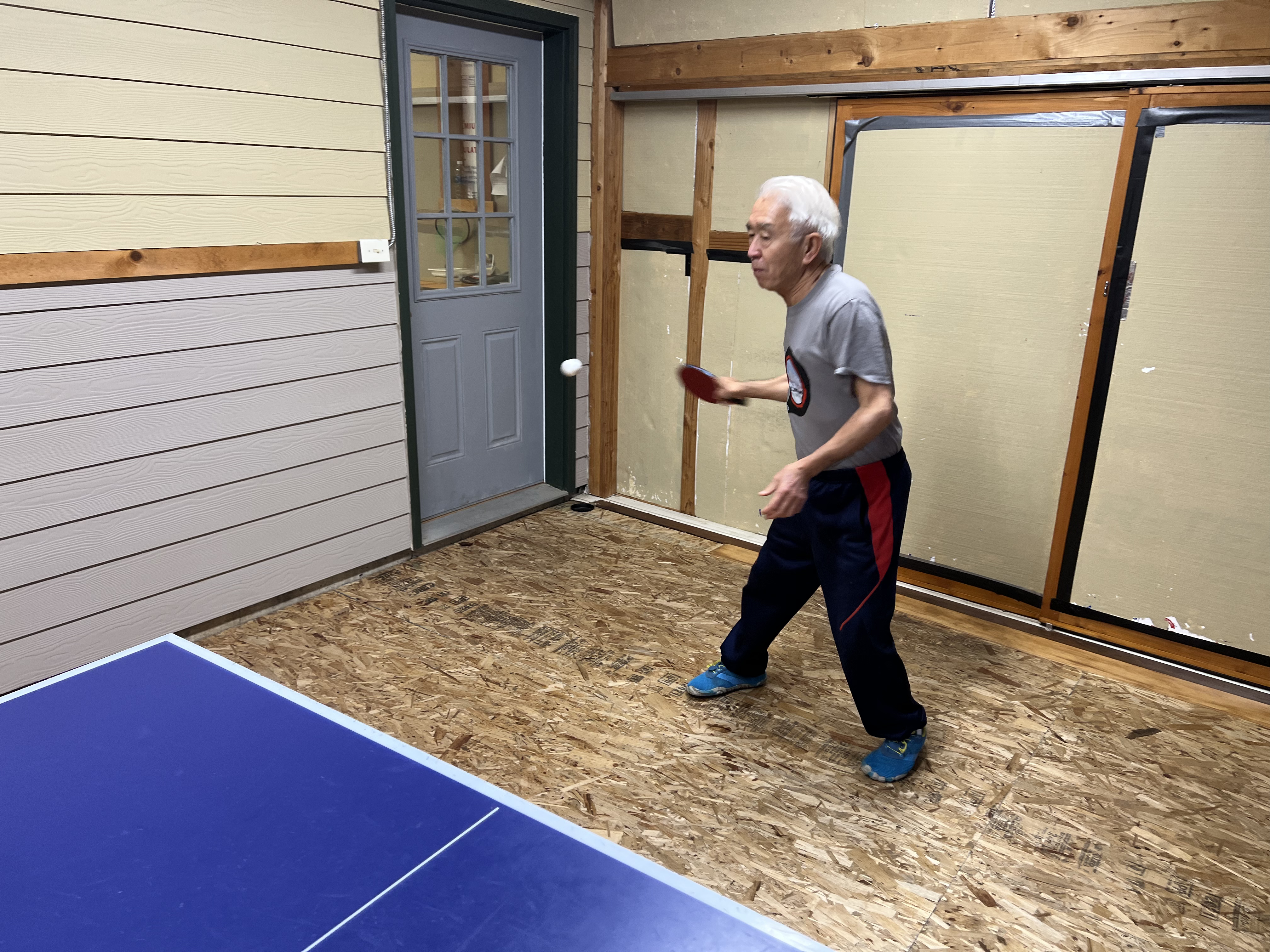 A table tennis forehand action shot at Bellingham Table Tennis Club